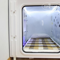 Molotoff Capsule Hotel Просторная капсула со всем нео