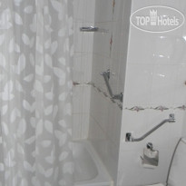 Матрёшка Плаза Душ в номере Skazka Twin