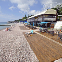 Фамилия Делюкс Пляжи оборудованы деревянными 