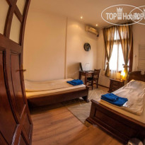 L Opera Guest House Номер