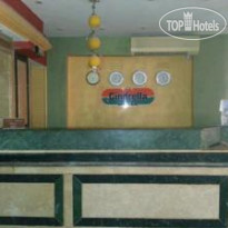 New Cinderella Hotel Стойка регистрации