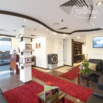 Xperience St. George Homestay ресепшн клуба Здоровья