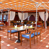 Xperience Sea Breeze Resort Ресторан «Genghis Grill»