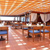 Xperience Sea Breeze Resort Ресторан «Genghis Grill»