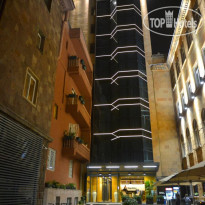 Republica Hotel Фасад отеля вечером