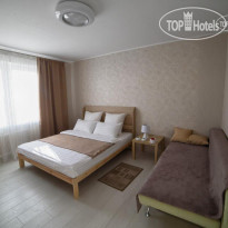 Apartment on Kozlova 1A PaulMarie кровать и раскладывающийся див