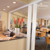 Hotel UHU Garni Koln Столовая