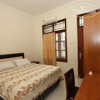 Tirtha Inn Pondok Anyar Номер