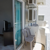 Cheshire Cat Hotel Балконы номеров отеля