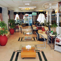 Liwa Plaza Hotel Apartments Лобби