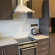 Milestone Hotel Apartment Кухня