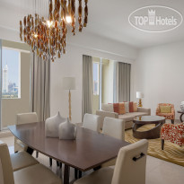 Marriott Executive Apartments Al Jaddaf Гостиная апартаментов с 3 спал