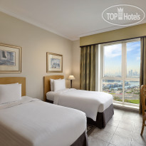 Marriott Executive Apartments Dubai Creek Спальня с двумя кроватями