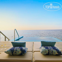 Machchafushi Island Resort & Spa Maldives Premium Sunset Overwater Villa