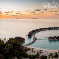 Sun Siyam Vilu Reef Savor breathtaking sunsets tha