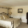Coachmans Inn a Four Sisters Inn Номер