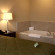 Cobblestone Inn & Suites - Durand Люкс с джакузи