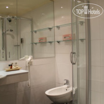Krumers Post Hotel & Spa Ванная комната в джуниор съют