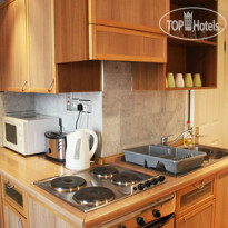 Hyde Park Suites Кухня