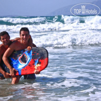 Seagulls Bay Village SURFING IN OUR BEACH
