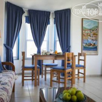 Zest xi beach Кухня в номере