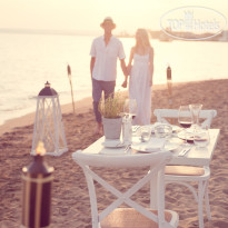 Ikos Olivia Романтический ужин на пляже дл