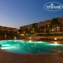 Village Mare One of the pools by night
