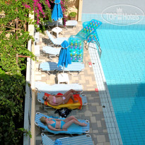 Melitti Hotel Pool sun loungers