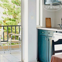 Melitti Hotel room kitchenette and balcony