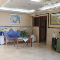 Tamaran Apartments Вестибюль