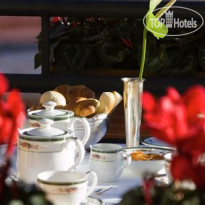 Suites Torre Dell'Orologio Завтрак