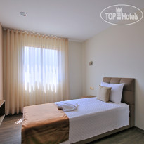 Delmar Suites & Residence