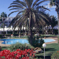 Club Sahra Beach Сад и бассейн