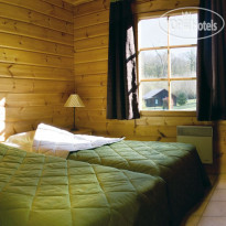 Le Grand Bois Спальня в коттедже