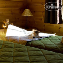 Le Grand Bois Спальня в коттедже