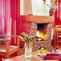 Chalet des Neiges Hermine Гостиная с камином.
