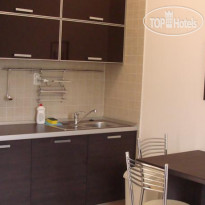 Alessandra Apartments Обеденная зона