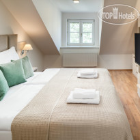 Louren Apartments Двухуровневые апартаменты с од