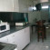 Capricorn Apartment Кухня