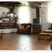 Garni Hotel Milena Гостиная с камином